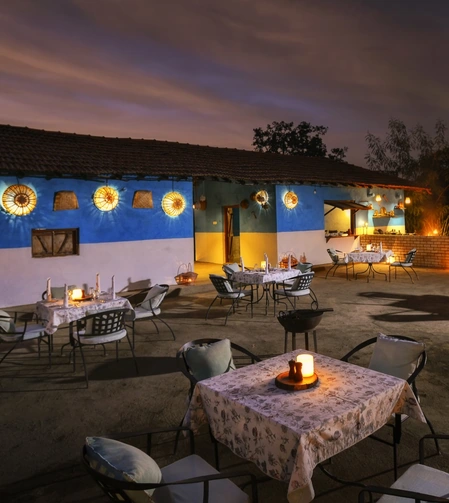 Farm dinner experience under the stars at Pench Tree Lodge